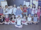 Elise Knaur Brigham with a group of children